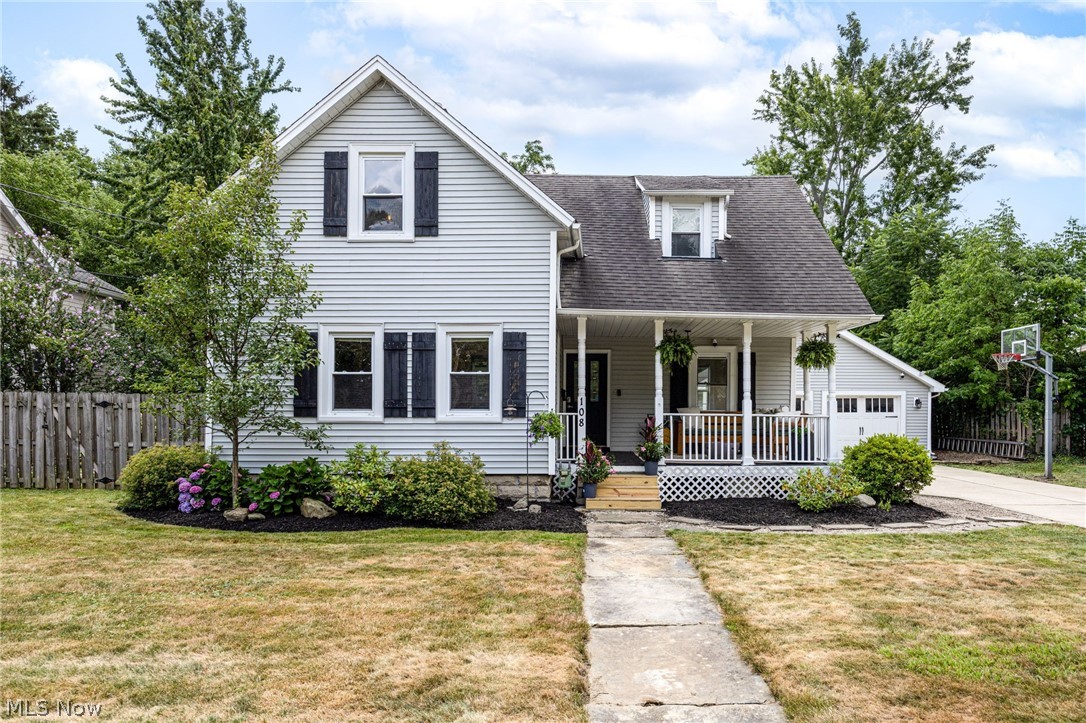 Welcome to this darling home in the heart of Berea. From the moment you walk up the front porch you'll be charmed by the appeal of this century home. Meticulously maintained and updated with all the amenities for today's homeowners, including a large kitchen with loads of counter space and featuring a vaulted sky lighted ceiling. Three bedrooms, two full baths, vinyl siding, newer two car garage with large concrete drive and basketball hoop. Let the summer days begin on your covered back porch overlooking a picturesque park like yard. Call today for your private tour before this beauty is gone.