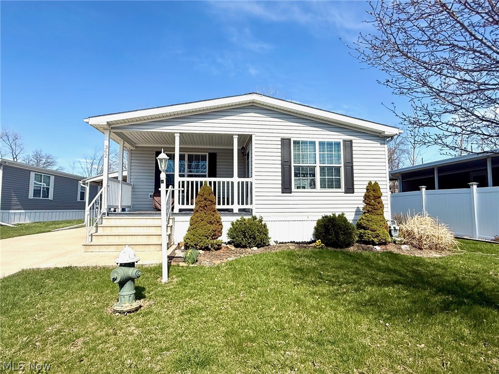 Welcome to Your New Home in Twin Lakes! This beautifully maintained 2017 manufactured home offers comfortable one-floor living in the sought-after 55+ gated community of Twin Lakes. Featuring 3 spacious bedrooms and 2 full baths, this home is perfect for those seeking both style and convenience. Step inside to discover an open-concept layout highlighted by a spacious kitchen with a large island and all appliances included perfect for entertaining or everyday living. The inviting living and dining areas create a seamless flow throughout the home. Enjoy your morning coffee or unwind with stunning sunset views from your charming front porch. The primary bedroom suite includes a private full bath and generous closet space, making it your own peaceful retreat. Twin Lakes offers an active and welcoming lifestyle with amenities such as a community center, exercise room, book club, game and card nights, bingo, potluck dinners, fishing, and much more. This home truly has it all modern comfort, community activities, and a serene setting. Don't miss your chance to call it home! Reach out to schedule your own private showing!