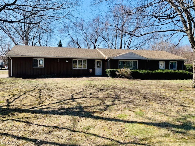 Location, Location!! Welcome home to this cozy ranch on a corner lot in Painesville Township. Just minutes from downtown. Single floor living and open floor plan make this home a must see. The kitchen is the center of the home that is open to the dining room/living room. French doors welcome you into the large family room with fireplace and leads outside through the sliding glass doors. Three bedrooms, 1 full bathroom, and laundry/utility room complete the layout.   Enjoy the beautiful spring and summer weather outside on the patio and the fully enclosed backyard with privacy fence. The shed stays for additional outside storage. We believe there is the original parquet flooring under living room and bedroom carpet. China cabinet in dining room and fireplace insert in family room stay. Schedule your showing today!!