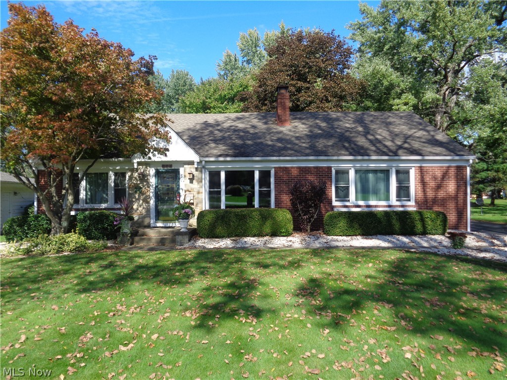 This charming brick ranch in desirable neighborhood is located near shopping, restaurants, and the highway. It offers 3 beds/1 bath, attached 2-car garage, first-floor laundry, and sunroom . Remodeled kitchen includes newer appliances. Driveway has been resurfaced. Additional features include hardwood floors, glass-block basement windows, two fireplaces, shed, newer doors and windows, and brand-new water heater. Home warranty included.