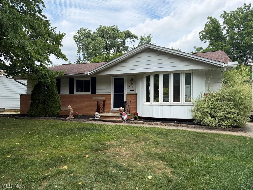 Welcome to 6671 Kingsdale Avenue in Parma Heights! This charming and well-maintained 3-bedroom, 1.5-bath ranch offers comfortable one-floor living with plenty of space to enjoy. The bright and inviting living room features a beautiful bay window that fills the home with natural light, while the dining area includes sliding glass doors that open to a covered patio—perfect for outdoor dining, entertaining, or simply relaxing while overlooking the backyard and mature trees. The large finished recreation room provides additional living space ideal for a family room, home office, fitness area, or game room. Recent updates offer peace of mind, including a new roof (2018), replacement windows (2016), and an updated bathroom (2026). Situated on a generous quarter-acre lot, the property also includes a 2-car garage and plenty of outdoor space to enjoy. Conveniently located just minutes from Greenbrier Commons, residents have easy access to the community center, library, swimming pool, playground, tennis and volleyball courts, and the Cassidy Theatre. Don't miss this wonderful opportunity to own a move-in-ready ranch in a desirable Parma Heights location!