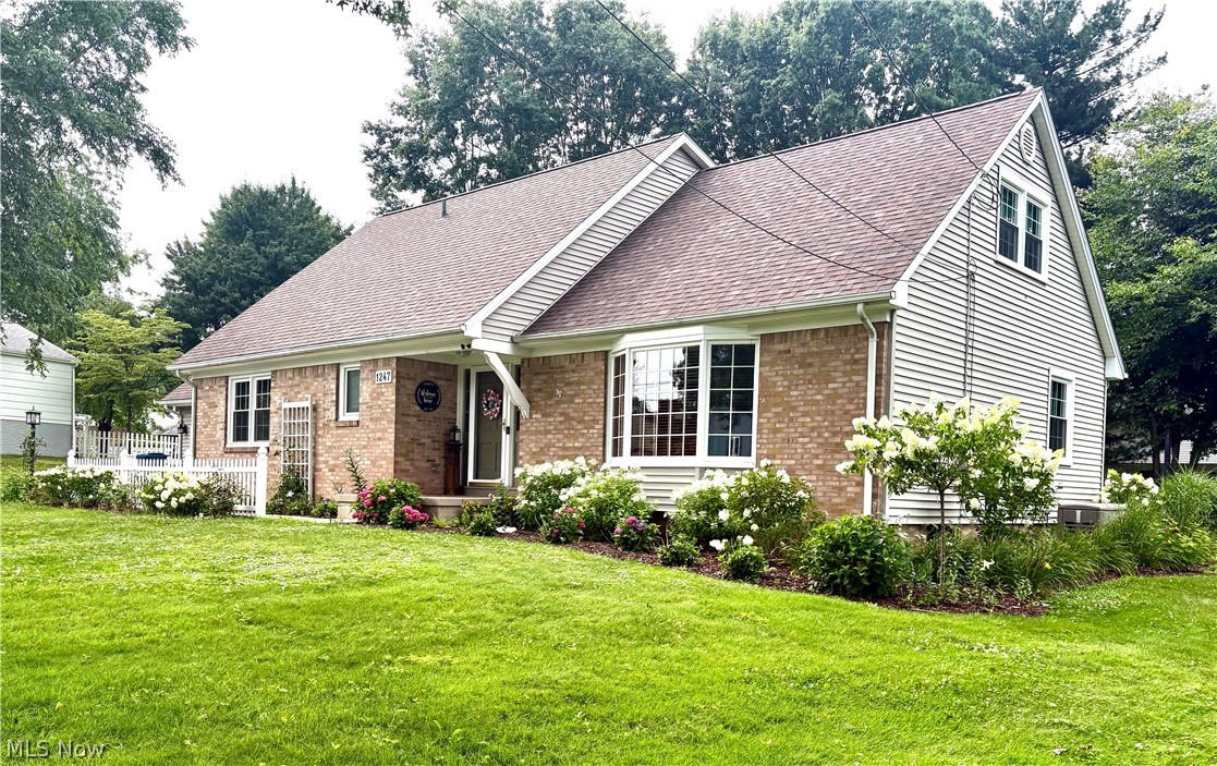 Welcome to this beautifully maintained 4-bedroom, 2-bathroom, brick/vinyl home in Salem. From the moment you arrive, you will notice the stunning landscape and curb appeal. Inside, spacious living areas offer comfort and functionality. Recent updates to the home include new roof, HVAC, tile tub surround in upstairs bathroom, all done in 2020. Fire pit and new garage door in 2022.  All new flooring on main floor, walk in shower, and whole house generator in 2023. New windows, appliances, garbage disposal, kitchen countertops (Baird Brothers), backsplash all done in 2024. Basement waterproofing, double sump pumps and air exchange in basement done in 2025. Enjoy morning coffee and relaxing evenings in the all-season room off of the kitchen. The backyard view is stunning with garden raised beds that have water access. This home has only had two owners and is waiting for you! Schedule your showing ASAP!