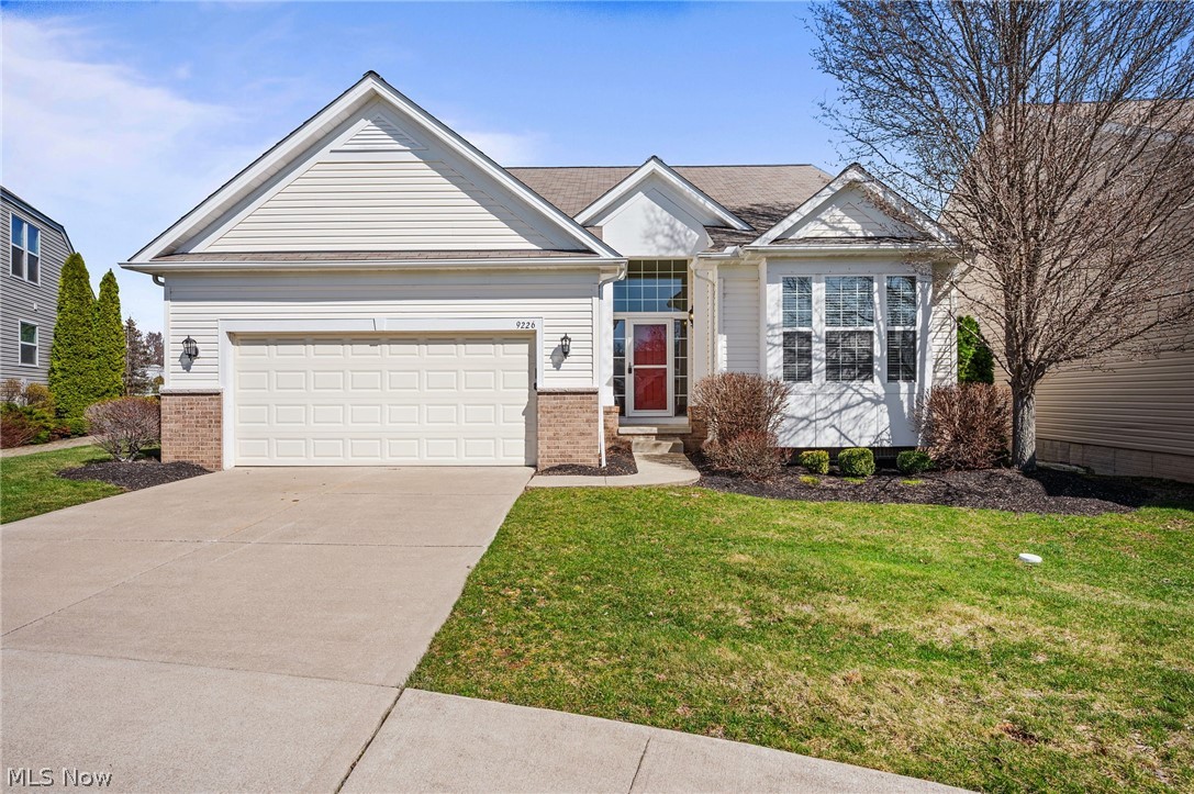 Welcome to 9226 Rainier Ct in the desirable Schneider Reserve community of Strongsville. Built in 2010, this well maintained home offers comfortable single-floor living in a convenient location just minutes from shopping, restaurants, and highways, making everyday errands and commuting simple. From the moment you enter, the beautiful foyer creates a welcoming first impression and sets the tone for the spacious layout beyond. Tall ceilings throughout the main living areas enhance the open feel of the home, while the vaulted living and dining room provide an airy gathering space filled with natural light from the many windows throughout. The living room flows directly into the kitchen, creating an ideal setup for both everyday living and entertaining. The kitchen features abundant cabinet space, stainless steel appliances, and durable Corian countertops. An eat in dining area sits beside a sliding glass door that leads to the rear composite deck, offering a great spot to enjoy your morning coffee or relax outdoors. A gas fireplace adds warmth and character to the main living space. This home offers three flexible rooms including two traditional bedrooms plus a dedicated office with elegant French doors that can easily serve as a third bedroom, guest space, or work from home setup. The spacious primary suite features vaulted ceilings, a walk in closet, and a private bath complete with a tiled shower and separate soaking tub. A second bedroom with a large closet provides comfortable space for family or guests, while the nearby full bathroom is conveniently positioned for both guests and everyday use. The full unfinished basement offers great storage and future potential, complete with plumbing rough in for a full bath. Residents of Schneider Reserve enjoy a low maintenance lifestyle with landscaping and snow removal included in a low monthly fee. This home offers comfort, convenience, and easy living. Seller is providing a 1 year Home Warranty for buyer’s peace of mind.