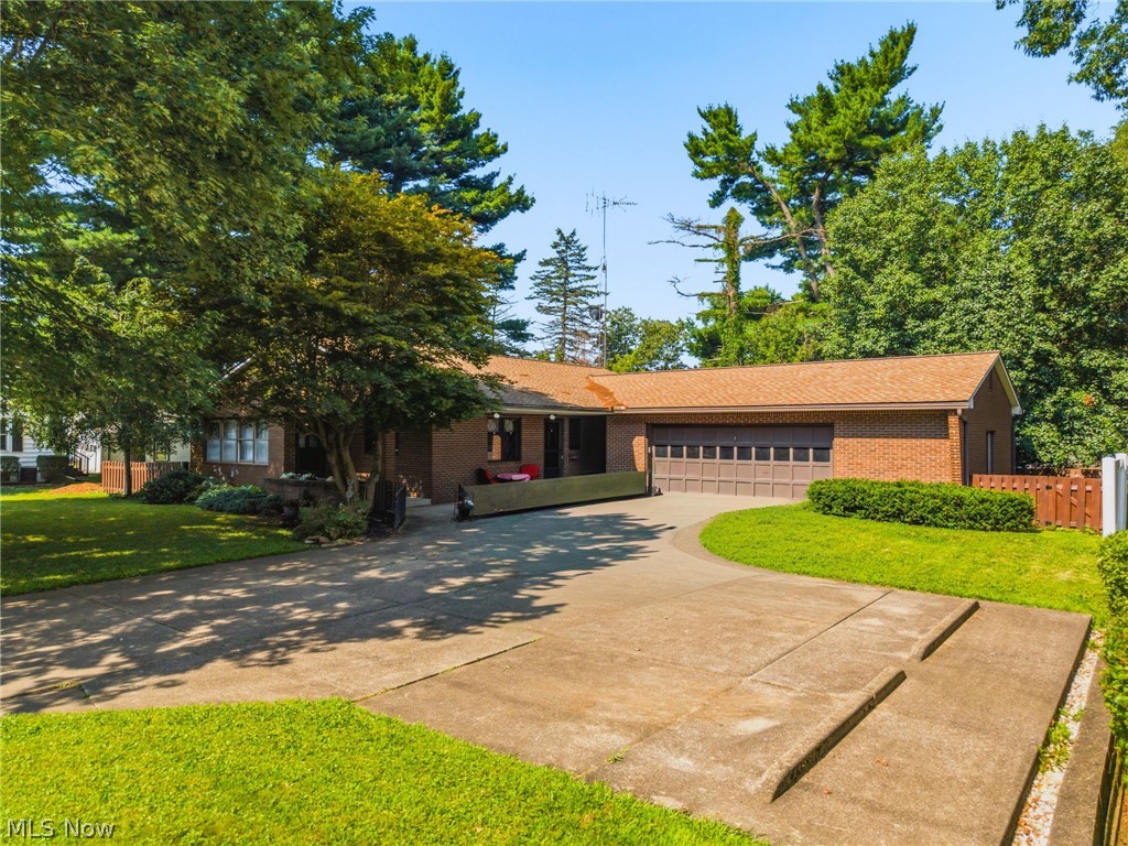 A home like this doesn't come along often. Thoughtfully designed, exceptionally well built, and truly move-in ready, this all-brick, ranch features wide doorways and an accessible layout. On top of that it offers the perfect blend of comfort, quality, and functionality.

Set back from the road for added privacy, this 2-bedroom, 2-bath home features over 1,500 square feet of beautifully maintained living space. The open-concept kitchen offers abundant cabinet storage and flows seamlessly into the spacious family room, where a charming whitewashed fireplace creates a warm and inviting focal point.

Both bedrooms are generously sized, including a primary suite designed with convenience in mind. Enjoy dual closets, direct access to the laundry room, and a private ensuite featuring a walk-in shower.

Downstairs, the clean basement features a large walk-in shower and offers endless possibilities for additional living space, a recreation room, home gym, or workshop.

Car enthusiasts, hobbyists, or anyone needing extra storage will appreciate the oversized attached garage with room for up to three vehicles, while the expansive driveway provides plenty of parking for family and guests.

Quality craftsmanship shines throughout this home and is complemented by numerous updates completed within the last few years, including luxury laminate flooring throughout, updated kitchen and bathrooms, a new roof (2021), and a new hot water tank.

Whether you're looking for accessible living, one-floor convenience, or simply a solid, well-cared-for home that's built to last, this property is truly one of a kind. Just unpack, settle in, and enjoy.