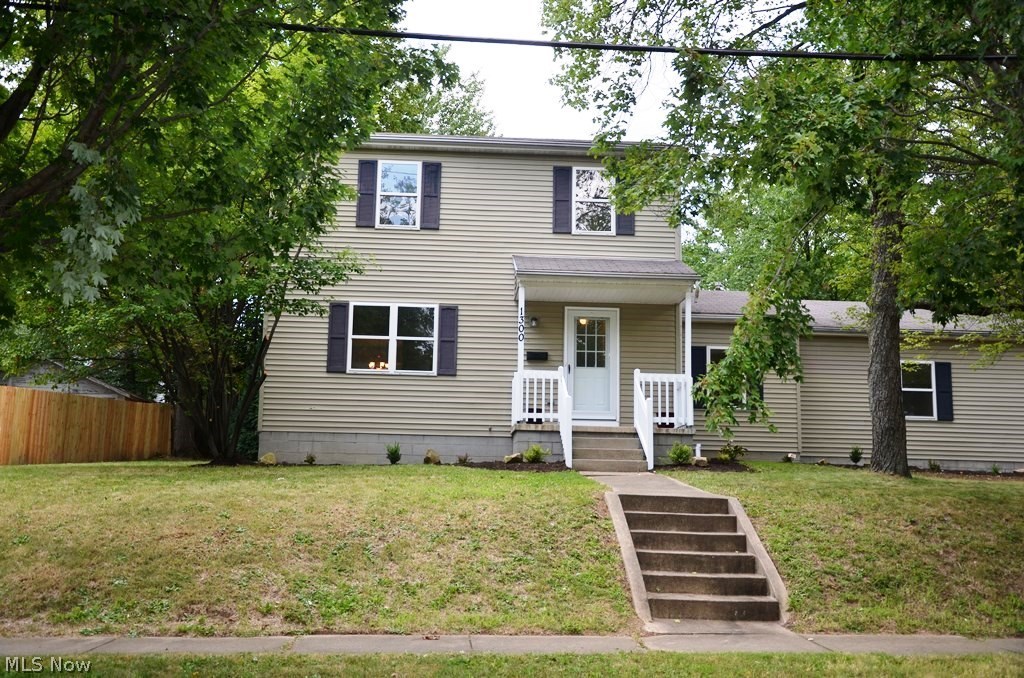 Welcome to 1300 Sunrise Dr, the completely renovated colonial with 3 bedrooms, 2 baths and 2 car attached garage. Built in 1997, setting on 3 parcels, this corner lot home offers everything you are looking for: new floor, new kitchen, new lighting and newly painted entire house. Enter the front door to the bright living room, which opens to the dining room, then to the back yard patio though a beautiful glass sliding door. A spacious bonus room on the first floor can be an office or study. There is a half bath on the first floor with new lighting and new toilet. The kitchen features brand new cabinets and Samsung stainless steel appliances. New laminate floor covers first floor hallway, living room, dining room and kitchen. The 3 bedrooms and full bath are on the upper level with new carpet on entire floor. Master bedroom has desirable walk-in closet plus a new shower and new toilet for the bathroom. There is a full basement with a lot of space for storage. The attached garage has bran