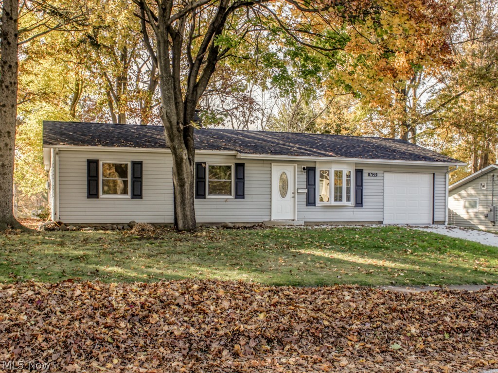 Beautifully updated ranch home in Stow. One floor living at its best. Kitchen has new cabinets, porcelain tile floor, mosaic back splash, and stainless steel appliances. Open kitchen and dining area have access to your patio overlooking the well sized, fully fenced back yard. Large master bedroom has walk-in closet and crown molding. Every room has been freshly painted. New carpet and padding in living room and all bedrooms. Bathroom completely updated including new porcelain tiles, vanity, tub/shower, sink, and cabinets. New roof in 2014.  Newer windows and siding. New concrete drive way and walk way. Updated electrical and outlets. Attached garage with new insulated garage door. Move in and enjoy.