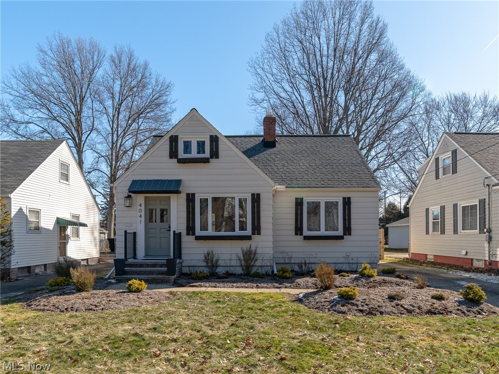 Welcome to this "Jewel Box Home"!  This is a home that has many higher end upgrades and finishes with out being overly large!  Upon entering you will notice the hardwood floors, built-in shelving, and electric fireplace in the living room, then the reading nook with open shelves or it could be an area for intimate seating, including built in cabinetry, quartz counter top, a wine refrigerator and contemporary light pendant.  From this large living room you enter the gorgeous dining room with wood beamed ceiling, new lighting and wainscoting and wall paper creating a versatile vibe for either contemporary or French country decor!  This room then leads to an incredibly spacious and bright sunroom with east and south exposure!  No seasonal affective disorder for a home owner here! The views from this room show off the deep yard that is fully fenced for children or pets.  Part of the fencing is stylish and made for privacy and the front gate is new style that I think you will love!  The sunny kitchen has so many wonderful updates including a pot filler, high end appliances, custom hood over the stove, deep sink, quartz counter tops, 2 different backsplashes add artistic flare, soft close cabinetry.  The remaining area of first floor has a lovely bedroom and newer updated full bathroom.  Upstairs has 2 more bedrooms both ample sized and a half bath between them that has also been updated.  Every room has been improved with a peaceful and flowing color palate.  This home is of sold construction with all the updating done for you!  In the basement you will find ceilings painted contemporary black with finished walls and LVP flooring and another electric fireplace.  Like most cape cod/bungalows there is plenty of storage.  Being located between Lorain Rd and Westtown Center on Center Ridge there are so many conveniences; so, come see for yourself all beautiful decor, great layout, and ease of living this home offers!