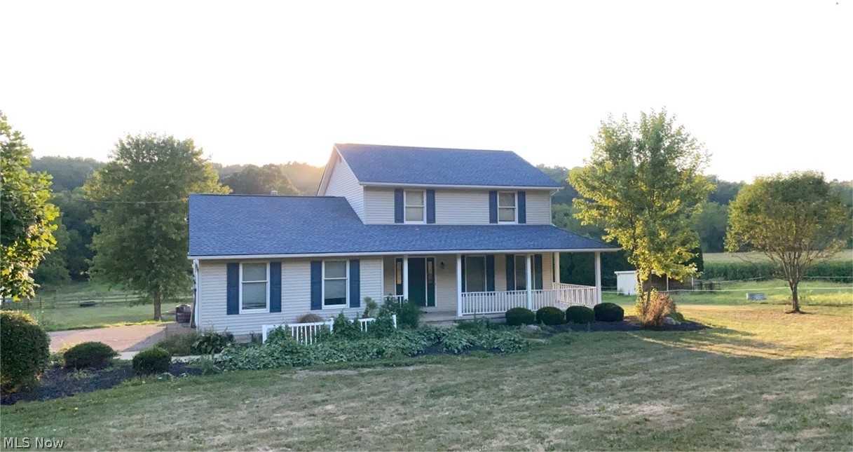 Nice 2-story home setting on 5+ acre lot. 3 bedrooms, 2 full and 2 half baths. First floor laundry and family room. Lower level has a partially finished bedroom and a recreation room. There is a 32X35 barn for horses and has 3 fenced pastures. Also, there is a detached 24X32 garage. Both buildings have water and electric.