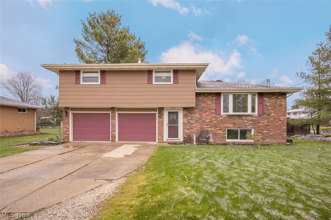 Great home that offers large living room with bay window for lots of light. Formal dining room features sliding door to back yard and is opened into large kitchen. Four good sized bedrooms and two full baths .Backyard is private and offers a large shed. Two car garage has a wood burner and work shop area. The windows were replaced a year ago and the furnace is two years old. Kitchen has new cabinets and countertop and floor. Backsplash is not completed due to some family issues but material is there for it.
