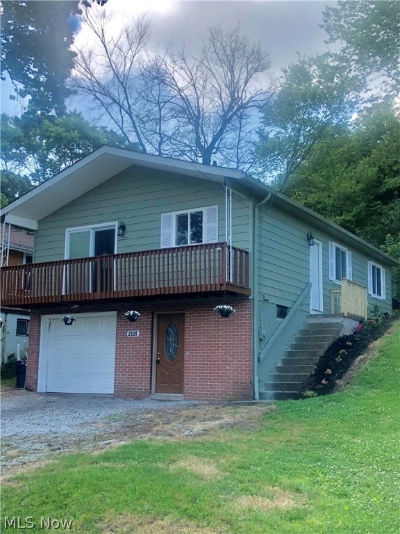 Here it is!!  The weekend lake house or year round nest.  A short walk from the dock and playground at Springfield Lake in the quaint Village of Lakemore.  This nicely updated ranch sits on its perch with beautiful sunset views from the outside deck.  The main floor features fully renovated kitchen with all new cabinets and appliances, butcher block counters, new flooring, 3 Bedrooms and updated bathroom and don't miss the newer windows and new light fixtures throughout.  The lower level (not included in square footage) was also updated adding additional useable space with inside access.  From the outside you can enter directly into the lower level entrance to find the perfect mud room with fresh paint and plenty of space to keep your bikes, fishing gear, kayaks and toys.  Behind this is a separate bonus space, a large rec room great for a kids' playroom, man cave, crafting corner or whatever your special need or desire may be.  The left side offers the single car garage, separate laun