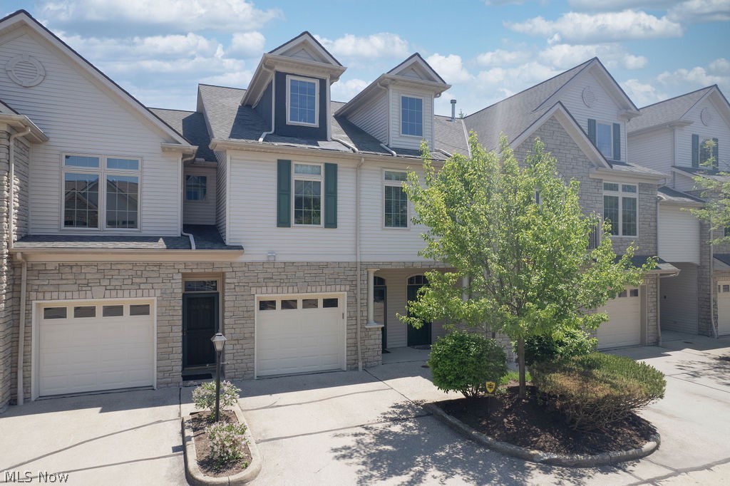 Welcome home to this beautifully maintained 2 bedroom, 2 bath ranch condo in highly sought-after Wedgewood Crossing.  The kitchen is European inspired with washer/dryer conveniently located.  Step inside to find tasteful decor, an open and inviting floor plan, and spacious living areas designed for easy everyday living and entertaining.  The generous primary suite includes a private bath and ample closet space.  The family room/sitting room off the kitchen has a stone fireplace and walks out to the private patio.  Ideal location with easy access to hospitals, shopping, dining, and freeway.  Comfortable, lovely condo.