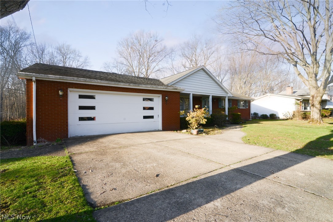 Here's your chance for a brick ranch that overlooks Mill Creek Park.  Spacious ranch with a door separating the bedrooms and 2 full baths from the living area.  Large well equipped kitchen.  Appliances stay.  Amazing basement area with a full kitchen, bedroom, full bath and rec room area.  Enclosed porch and concrete patio overlooking the park.  Oversized 2 car garage with drain, H/C water & extra storage.