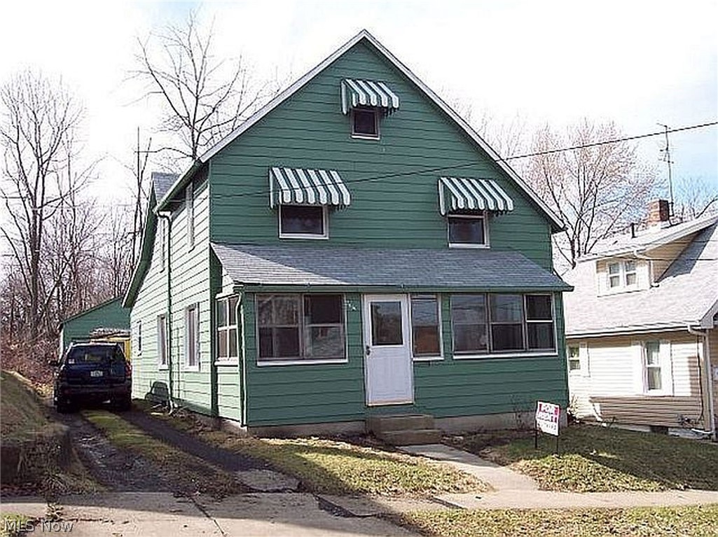 FHA Approved Appraisal is good until Dec. 6th.  Appraised well above asking price and all FHA repairs were completed.  Clean spacious move in ready 4-5 bedroom.  Great investment opportunity with first floor master bedroom and full bath.  Dining, large eat in kitchen, sitting room, living room.  Front and rear enclosed porches, has newer vinyl windows.  Detached 2 car garage.