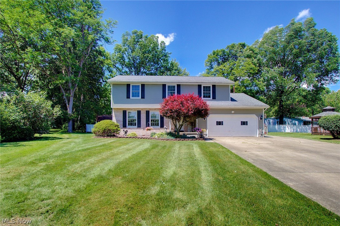 Don't miss this beautiful Colonial home in Boardman! The home is located in Canfield School District. The home features 4 bedrooms, 3 full baths, 2 laundry rooms, Family room, finished basement with gas fireplace, living room and dining room.  The back yard has a beautiful large deck for cookouts and entertaining, complete with a beautiful large gazebo! A new furnace was installed just last week.  Pella Windows throughout the home, roof and siding are less than 10 years old. Glass block windows in the basement! More photos will be added.