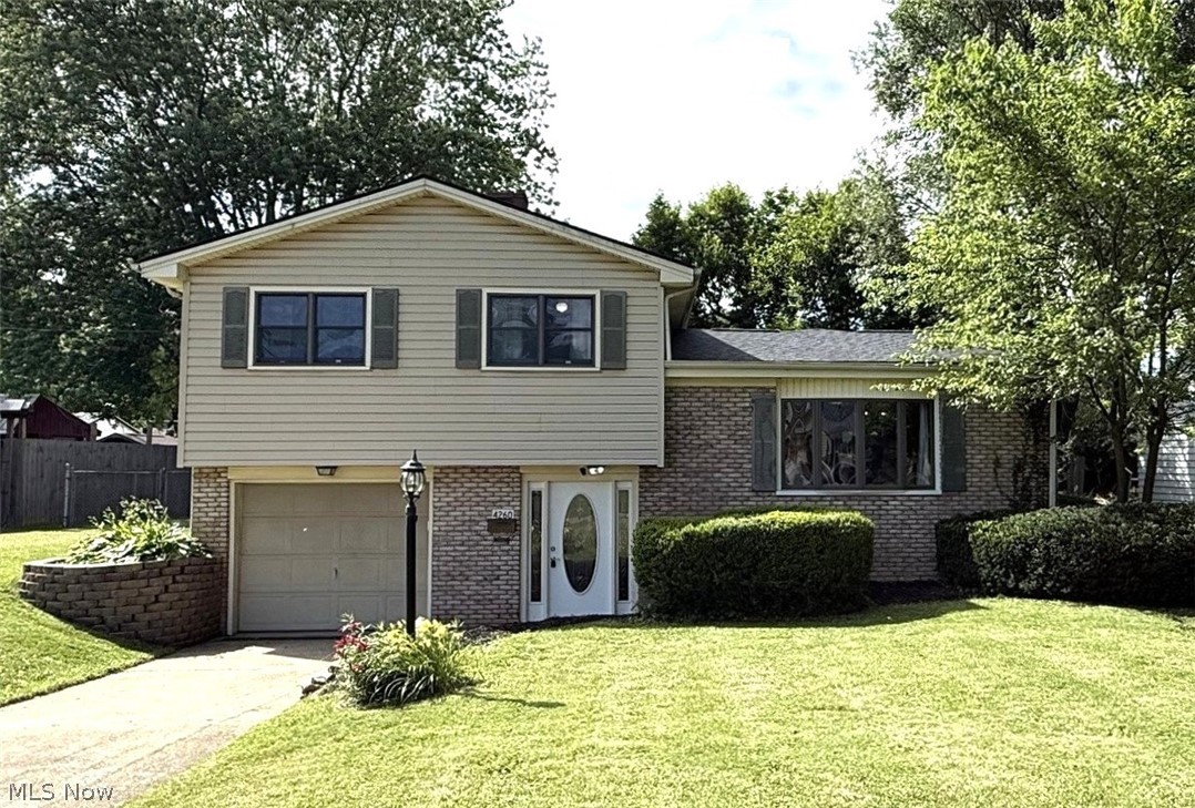 Welcome home to this beautifully updated and move-in ready split-level in Austintown! Offering 3 bedrooms, 1.5 baths, this freshly painted home featuring an inviting open-concept layout designed for comfortable living and effortless entertaining. A mixture of hardwood floors, carpet, solid oak cabinets, vaulted ceilings, oversized bay windows, and abundant natural light create a warm and welcoming atmosphere throughout. The spacious family room and living room provide plenty of room to gather, while the eat-in kitchen comes complete with a range/oven, dishwasher, and refrigerator. Outside, enjoy the fully fenced backyard and attractive brick and vinyl exterior. With a new roof installed in Fall 2025 and a location close to schools, shopping, restaurants, and more, this home is ready for its next owner.