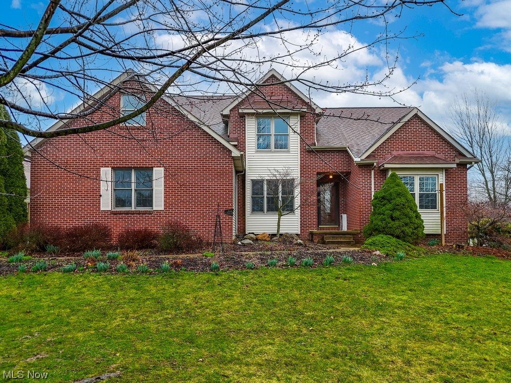 Welcome to this impressive 5 Bedroom, 3.5 Bath dream home in beautiful Wadsworth! Situated on over 2 acres, enjoy outdoor living and entertainment in the charming Sunroom surrounded by sliding doors opening to the wrap-around composite deck overlooking the backyard oasis featuring an Inground heated Pool and garden with a small potting shed. Step inside to discover the Open Floor plan redesigned in 2017 for a seamless flow between the Great Room with soaring vaulted ceilings accentuating the  floor to ceiling brick fireplace flanked with a wall of windows and the spacious renovated Gourmet eat-in kitchen with Granite countertops, plentiful custom Cherry Cabinetry with soft close drawers, and a convenient breakfast bar. The first-floor Master suite features Hardwood floors, a cozy window seat, and dual closets. Pamper yourself in the Master bathroom complete with a corner garden Jetted tub, walk-in shower, dual sink vanity, and a walk-in closet. A formal dining room (currently used as a media room) rounds out the first floor. Head upstairs to four bedrooms, including one bedroom with an en-suite bath. The remaining bedrooms share access to another full bath. The 2nd floor also includes a Bonus room that could be used as a sixth bedroom, office or studio - your choice! In addition to the attached 2-car garage, the hobbyist will appreciate the large outbuilding capable of housing 4 cars or even a boat! Additional highlights include a Partially Finished Basement with a Rec room and abundant storage throughout, a First-floor laundry/mudroom, and a 1-year Home Warranty for the Buyer's peace of mind (Pool coverage included). Plus, enjoy the convenience of a newer H2O heater (1 y/o), tear-off roof and HVAC (both ~10 years). Located in the highly-rated Wadsworth City School District and with easy access to I-76 and I-71, this home also offers proximity to River Styx Park and Ridge Top Golf Course. Don't miss the opportunity to make this your forever home!