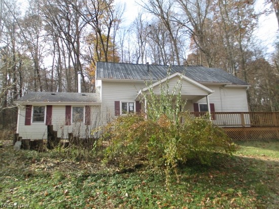 Country setting offers large unique kitchen with brick floors, open dining and living room concept, updated bath room. Main floor has one bedroom with 2 other rooms framed in and not completed, 1/2 story has 2 rooms. 
Selling in as is condition with no warranty or guarantees, HUD case 413-546665. FHA financing available with escrow for repairs by buyer, or 203K re hab loan.