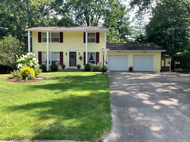 Here you go! Now is your chance to get a 4 bedroom home on a cul-de-sac in Stow! Most of the home has hardwood floors under the carpet.  The furnace, AC and hot water tank are between 2-3 years young.  The fridge is about 3 years old. About half of the windows have been replaced.  This lovely home is painted in neutral tasteful colors and it also features a fabulous and spacious deck off the living/dinette area, with stairs down to a wooded semi private back yard.  There is still plenty of yard for firepits and play areas!  The driveway has an additional third parking lane.  This home also has a shed, but it will need some TLC as some of the wood has some damage and could use some siding over it. The 2 car garage also has 2 new doors and new garage door opener!  The basement is partially finished and has a door to walk out to the back yard.