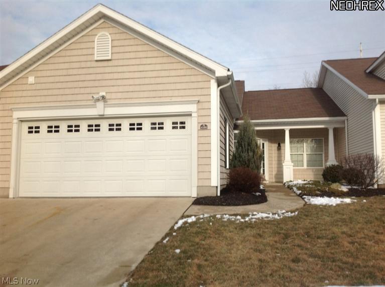 This amazing ranch style condo has it all!  Lots of upgrades!  Kitchen has maple cabinetry w/ glass doors, high definition  Wilsonart counter tops, engineered hand-scraped wood flooring.  Dinette has a bay window.  All appliances are stainless steel.  large foyer with wainscoting, cathedral ceilings, sunny sun room which leads to a patio, walk-in closets, upgraded trim package throughout.  Clubhouse with kitchen/billiard room/exercise and party room is included with pd. monthly HOA.