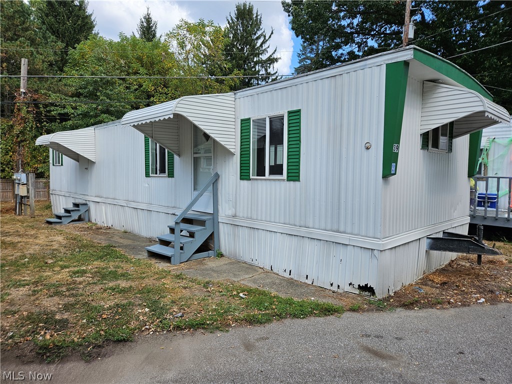 UNIT #39   This is a beautiful mobile in a great location!  Across from Springfield Lake!  Recently remodeled throughout, this 2 bedroom mobile has a nice & open kitchen to living room space, 2 bedrooms, 1 full bath with washer and dryer hook up.  Outside you have a nice green space to enjoy the outdoors!  Close the bus line, shopping, eateries and more.  There is an application process through the park.  All mobiles must be owner occupied.  Mobiles cannot be moved.  Mobile owners pay all utilities.