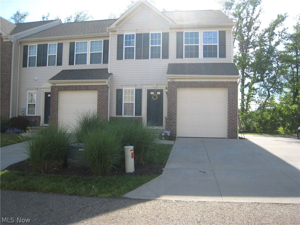 Gorgeous end unit condo welcomes you with an open & inviting floor plan. A sunroom lets in lots of light.  This home features 3 large bedrooms, 2 full baths, a 2nd floor laundry. Great room opens to an eat-in kitchen.  Newer carpet on lower level. Full basement with lots of potential to finish.  Master bedroom has a gorgeous master bath. A one car attached garage & extra parking.