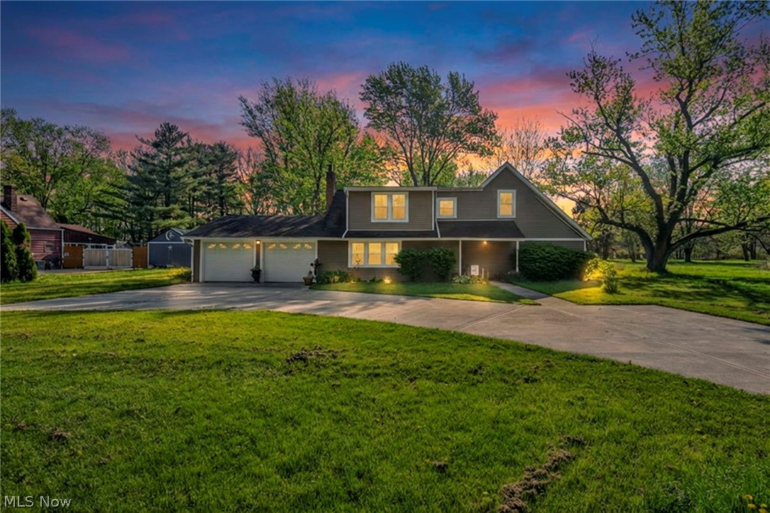 Exceptional find offering the perfect blend of country-style living w/modern updated conveniences-Just minutes from shopping, dining, & highways! Situated on nearly an acre in desirable Olmsted Township (no RITA taxes), extensively remodeled inside & out, delivering a fresh, elegant, move-in-ready interior w/minor finishing needed on the glamorous owner’s bath (most materials included). Step inside to a bright, open floor plan filled w/natural light & spacious, sun-drenched rooms. Showstopping chef’s kitchen designed to impress, featuring premium shaker-style soft-close cabinetry w/dovetail drawers, gorgeous granite countertops, 5-burner gas range, farm sink, custom tile backsplash, modern can lighting, plus stunning oversized island w/seating for eight & built-in storage-Perfect for entertaining. Newly added formal dining room w/tray ceiling & recessed lighting offers flexibility as dining space, office, additional living area. Inviting family room showcases a cozy corner fireplace, updated lighting, durable new LVP flooring. Convenient first-floor laundry & full bath w/walk-in shower add to the home’s functionality. Retreat to the dramatic vaulted owner’s suite w/walk-in closet & private bath ready. Enjoy outdoor living w/private backyard & arge new driveway w/extensive drainage & ample parking. Major updates: kitchen appliances (2022), A/C (2020), garage door, $15K driveway/drainage, kitchen renovation (2017), roof, gutters, siding, exterior paint (2016), flooring (2015), furnace, hot water tank, electrical panel (2014–2015), newer windows. Magnificent home.