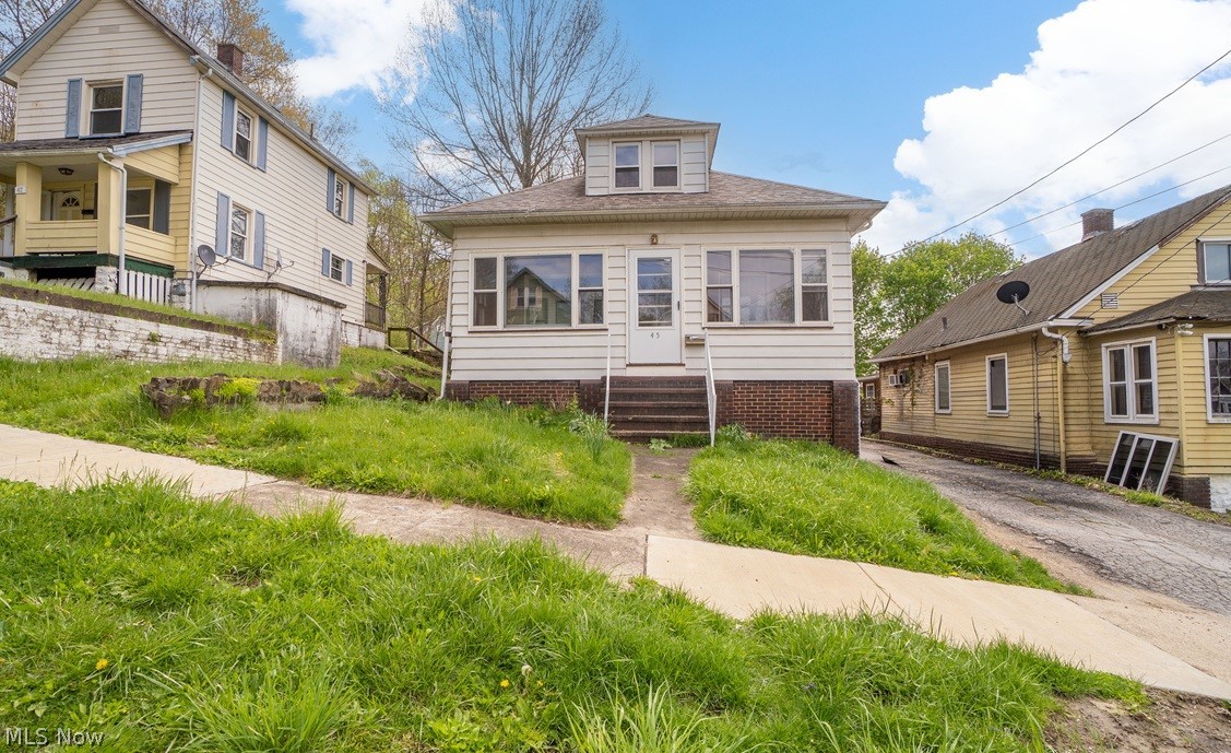 Take a look at this recently remodled home on a quite, dead end street. The kitchen has been updated with new flooring, white cabinetry, wooden countertops, and stainless steel appliances. The dining room and living room both have hardwood flooring throughout. The bathroom has been updated with tile flooring, tile wainscotting, and a white vanity. The bedrooms have hardwood flooring. There's a new bedroom in the basement, and an extra room on the 2nd floor that could be used as a 4th bedroom. There's also a spot at the end of the driveway where a garage or car port could be built. Come and make this your new home today!