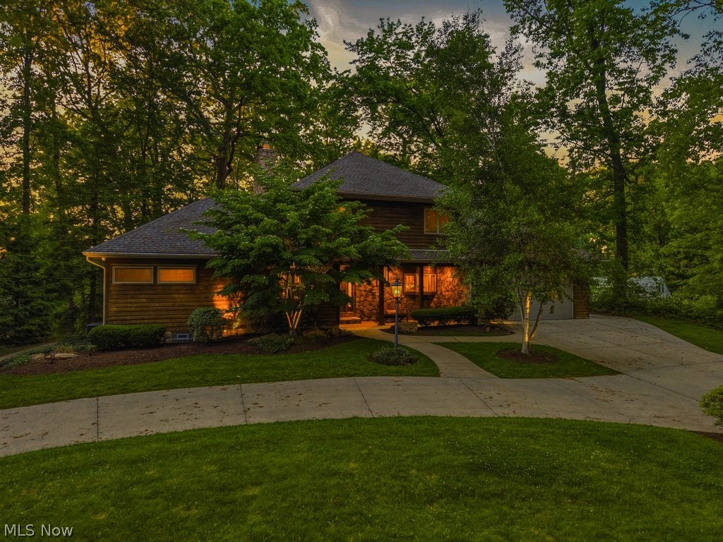 Priceless!! Imagine serene river views as you relax in your private backyard oasis—this EXCEPTIONAL CUYAHOGA RIVER PROPERTY delivers. A dramatic wall of windows brings the outdoors in, while a full-length deck and walk-out patio create seamless indoor-outdoor living. Follow the paved, lighted path to your private riverfront deck, where you can launch your kayak or cast a line for trout.

Situated in the charming River Estates, this 5-bedroom home provides it all! Three bedrooms on the main level accommodate family and guests and/or office space.  Upstairs is a spacious primary bedroom suite with its own balcony providing birds' eye views of the property and the Cuyahoga River.  The fifth bedroom provides additional space for an office, sitting room/library or nursery.  The finished walk out lower level, with private patio, has two expansive spaces for entertaining or relaxing.

Perfectly positioned near highways, shopping, hospitals, universities and schools—and walking distance (less than a mile) from the vibrant Front Street restaurants—this move-in-ready home offers the ultimate riverfront lifestyle!!  Make this incredible property yours for summer enjoyment!