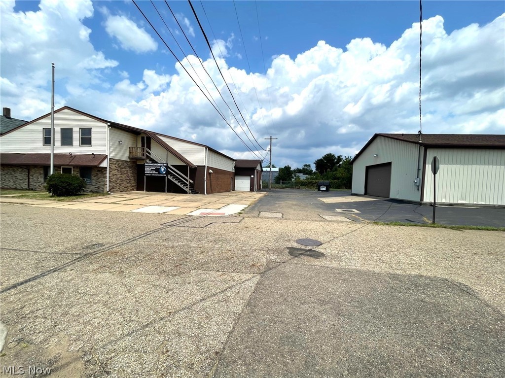 Two adjacent buildings for a total of 9,100 sf. Zoned I-1 (Light Industrial). 1107 Melchoir Place SW 6,300 sf of shop & office space & 806 Cook Ave. SW 2,800 sf of warehouse space. Zoned light industrial (I-1). 1107 Melchoir Place SW: Shop area 3,912 sf & office area 2,388 sf. Electrical updated 2020. 600-amp electrical service. Shop area consists of 6 rooms. Room 1: 40'x22', 9' ceiling & man door to front of building; Room 2: 30'x30', 12' ceiling, 8' OH door with opener; Room 3: 30'x27', 11' ceiling; Room 4: 30'x37' with man door to back fenced-in area with security lights; Room 5: 26' x42', nature stone floor; Room 6: 35'x25', 9' ceiling, compressor & man door. Shop area has half bath & an area with a slop sink.  Office area consists of a 25'x12' first floor lobby & second floor has 3 offices, a bath with shower and storage area. Office 1: 30'x26', kitchen area with oak cabinetry. Off this office is a 12'x40' storage area. Other 2 offices are 25'x12' & 15'x10'. 806 Cook Ave. SW:  2,800 sf heated & air-conditioned warehouse. Space is open, 12' ceiling, one 10'x16' OH door with opener, 3-phase 240/480 electric, 10-inch concrete floors, floor drain, 2 man doors, sink in garage area & a large restroom. 1107 Melchoir is vacant and 806 Cook is currently leased on a month-to-month basis for $1700 per month.