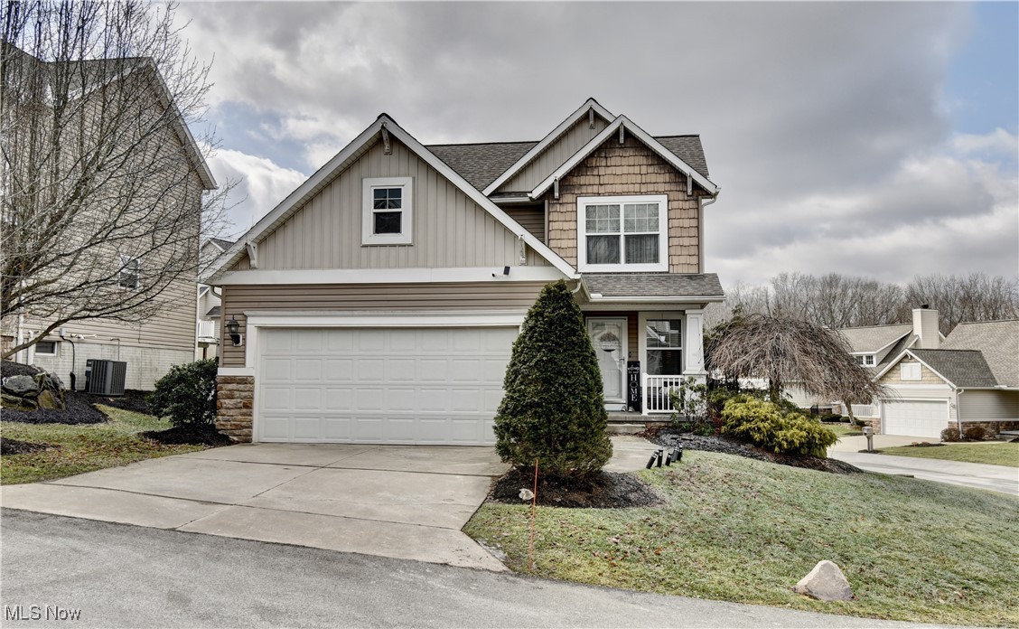 Welcome home to this stunning colonial with an open floor plan. Step into the spacious great room, which is open to the gorgeous kitchen offering an abundance of cabinets, stainless steel appliances, backsplash and a large breakfast bar. The dining area leads to a large deck with pergola, screen for watching movies, and plenty of room to entertain. The first floor includes a laundry area and half bath. The fabulous lower level features a large custom wet bar with backsplash, family room with built in entertainment center, and ample storage space. Plenty of room for entertaining. Upstairs, you will find a spacious master bedroom with a ceiling fan, walk in closet, and full bathroom. The upstairs is completed with two additional bedrooms, each with ceiling fan, ample closet space and a second half bath. Two car attached garage. Roof new in 2019. Nothing to do but move in!