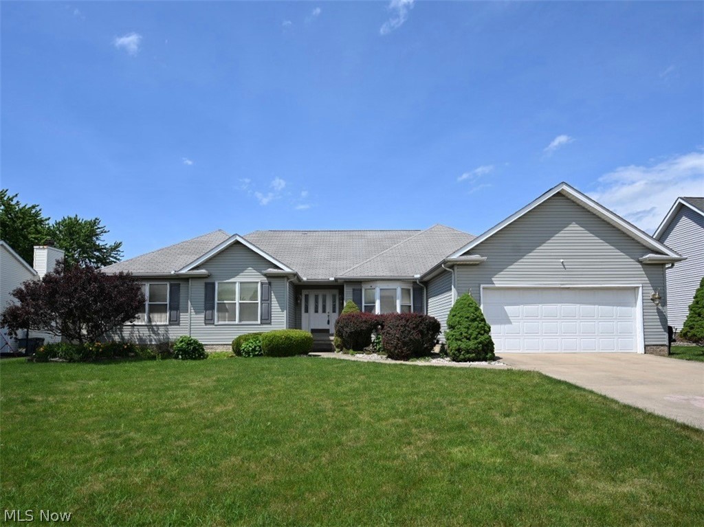 Welcome to this spacious 3-bedroom, 3.5-bath ranch located in a desirable, quiet neighborhood. This home offers comfortable one-level living with thoughtful features throughout. The main floor features a combined dining and living room area, perfect for entertaining. A large kitchen opens to a cozy family room with a fireplace, ideal for relaxing evenings. You'll also find a convenient first-floor laundry room and a powder room for guests. The primary suite is spacious and offers an attached bath, a walk-in closet and access to the backyard deck. Downstairs, the expansive basement provides incredible versatility. It includes two finished rooms that could easily serve as additional bedrooms, a full bath, a second living area and a small kitchen, making it perfect for extended family or guest quarters. The backyard has plenty of space to run and play, plus two sheds for extra storage. As a bonus, the seller is including a one-year home warranty for a worry-free purchase. Don't miss the chance to tour this lovely home. It has all the space, style and conveniences you've been looking for.