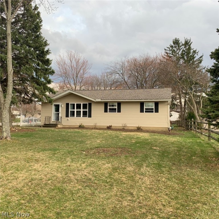 It's here the Home you have been waiting for!!  This Ranch is situated on a deep lot with a Huge patio perfect for Family Fun & Entertaining.  Upon entering you will love the bright & open floor plan that features high end vinyl plank wood look flooring (2018) throughout the main level. An updated Kitchen  (2018) offers beautiful cabinetry with modern concrete countertops and all appliances remain.  The wood plank Feature Wall makes a statement in the Master Bedroom which also offers an attached Full Bath.  The spacious updated Recreation Room (2014) is warmed by a gas fireplace for those cold winter nights.  With an abundance of shelving, the unfinished side of the basement offers plenty of storage.  The washer & dryer remain.  This home already has public sewers so there is no assessment for the recently completed sewer work along Drake Rd.  Furnace & HWT (2014), Roof, Range, Refrigerator, Washer & Dryer (2009).  Come and see for yourself!
