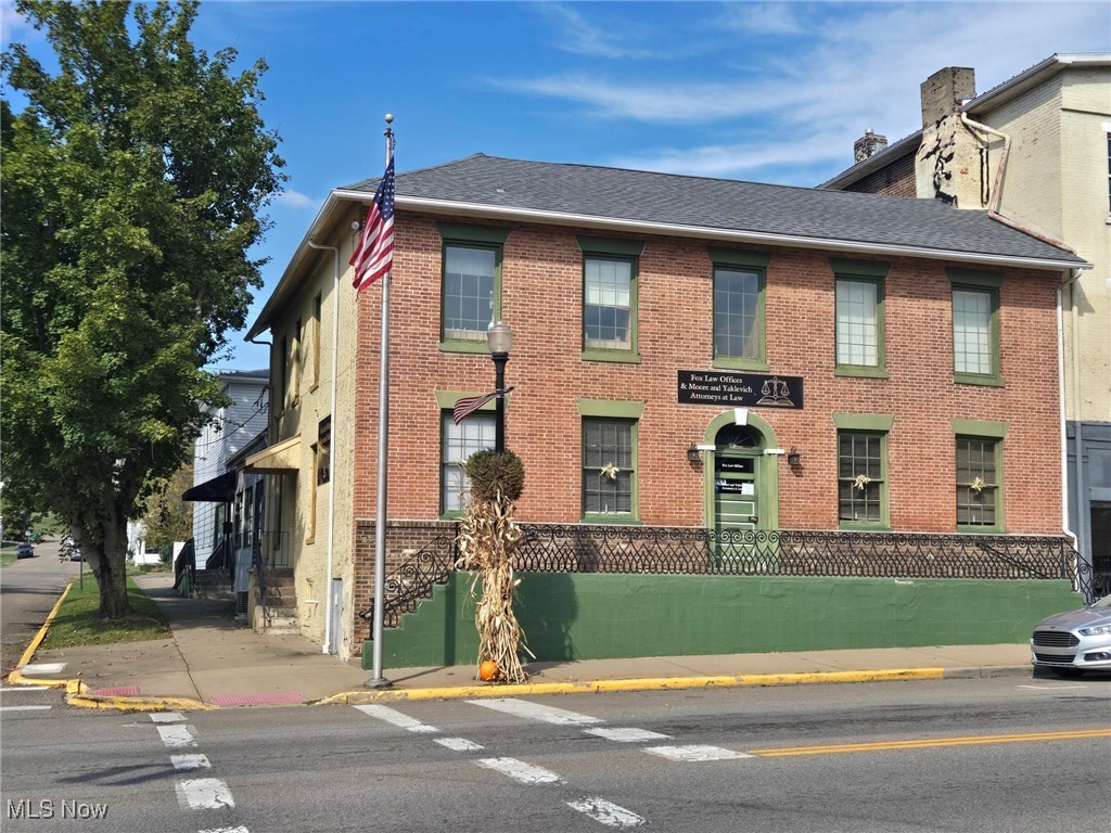 Unleash the potential of this exceptional mixed-use property, perfectly situated just steps from The Square in the heart of the historic Village of McConnelsville. This is an ideal investment for owner-occupiers looking to live where they work or investors seeking a versatile, high-visibility asset. The first floor is prime commercial space with 5 dedicated, professional office spaces, perfect for a law firm, accounting practice, medical group or tech startup. Fully-equipped conference room for meetings, presentations and client consultations. Large, open flex space that can be customized for retail, a collaborative workspace or expanded office use. Rear access storage area features full overheard garage door for easy deliveries, equipment storage or vehicle access. Additional storage space located conveniently above the garage area. The second floor is a desirable residential unit with modern, comfortable 2 bedroom, 2 bathroom apartment. Excellent owner-occupier lifestyle or a steady stream of rental income. Enjoy this high visibility and constant foot traffic from its unbeatable downtown location near the bustling square. Your business will benefit from the charm and activity of McConnelsville's historic commercial district.