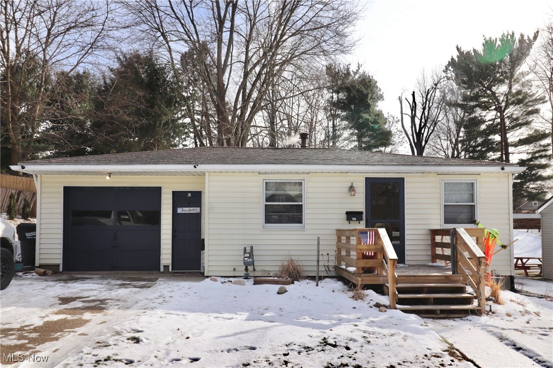 Well-maintained 3-bedroom, 1-full bathroom ranch offering convenient one-floor living.  The home features a full, partially finished basement providing additional recreational space or storage.  Enjoy outdoor living with a covered front porch and a rear patio, perfect for relaxing or entertaining.  An attached garage adds everyday convenience.  A solid layout with great potential, ideal for owner occupants or investors alike. Updates include Hot water heater installed 11/10/24, new paint in some of the interior, newer roof, Bathroom and Kitchen mostly remodeled.