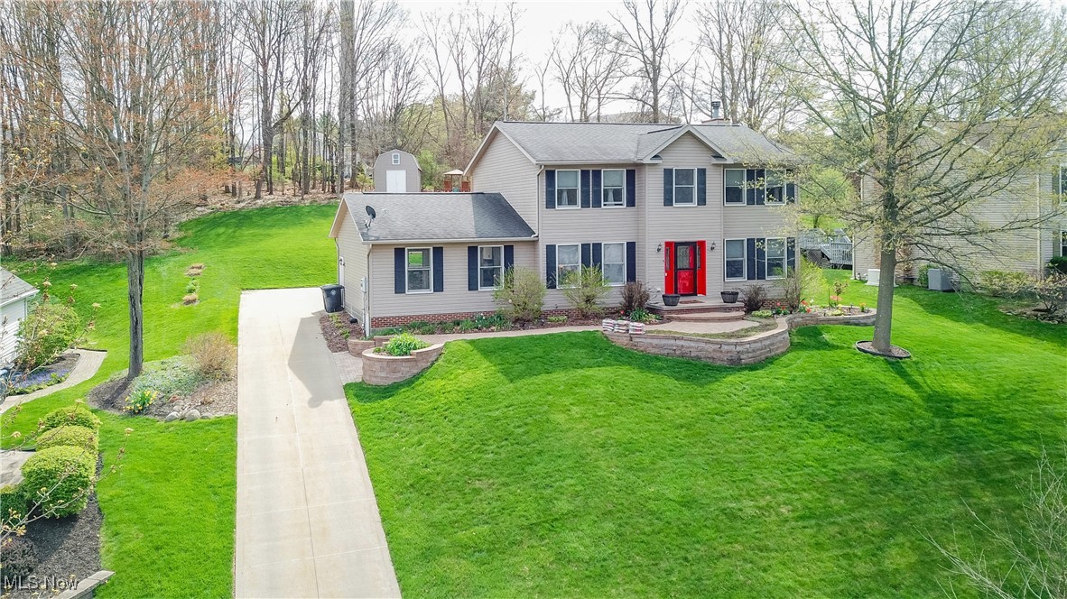 Welcome home to this beautifully maintained 3-bedroom, 2.5-bath colonial nestled in the highly desirable Cross Creek development. Step into a grand two-story foyer that sets the tone for this inviting and spacious home. A formal dining room with a built-in bar offers the perfect setting for hosting, while the generous living room features a cozy fireplace-ideal for relaxing evenings. The renovated kitchen is a true highlight, complete with newer appliances and an additional dining area that opens to the backyard through brand new 2024 Pella sliding glass doors. Step outside to enjoy the expansive patio, perfect for entertaining, along with a beautifully landscaped yard featuring a swing set and a storage shed. Upstairs, you'll find a serene owner's suite with a private full bath and walk-in closet. Down the hall is an additional full bathroom connected to a convenient laundry room, with functionality in mind (washer and dryer included). Two additional bedrooms round out the upper level. The finished basement adds even more living space, including a versatile extra bedroom, a dedicated workout room, and plenty of storage. Additional features include a brand new 2025 furnace and hot water tank, and a 1-year home warranty is included for your peace of mind. Don't miss this opportunity to live in one of the area's most desirable neighborhoods-schedule your private tour today!