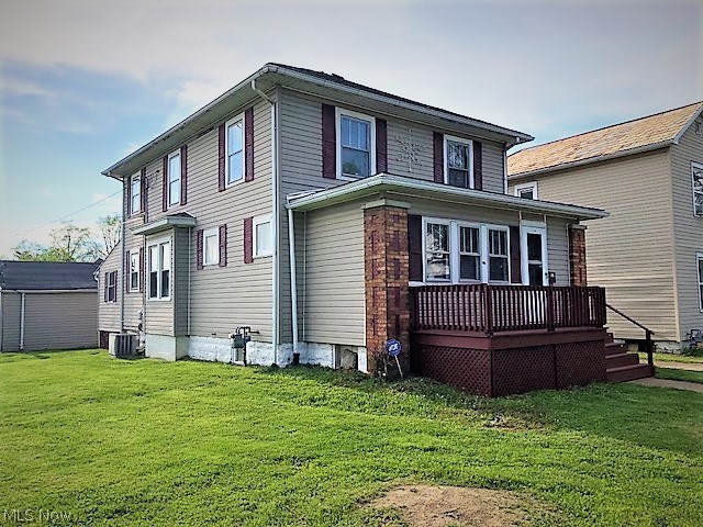 Very clean and updated 2 story home offering 4 bdrms. (1 on main level), 2 full baths (1 up and 1 on main level), nice large living room w/ornamental fireplace, formal dining room w/window seat, original woodwork through out in excellent condition, freshly painted top to bottom, all new floor coverings, 4 new garage doors and brand new furnace and central air.