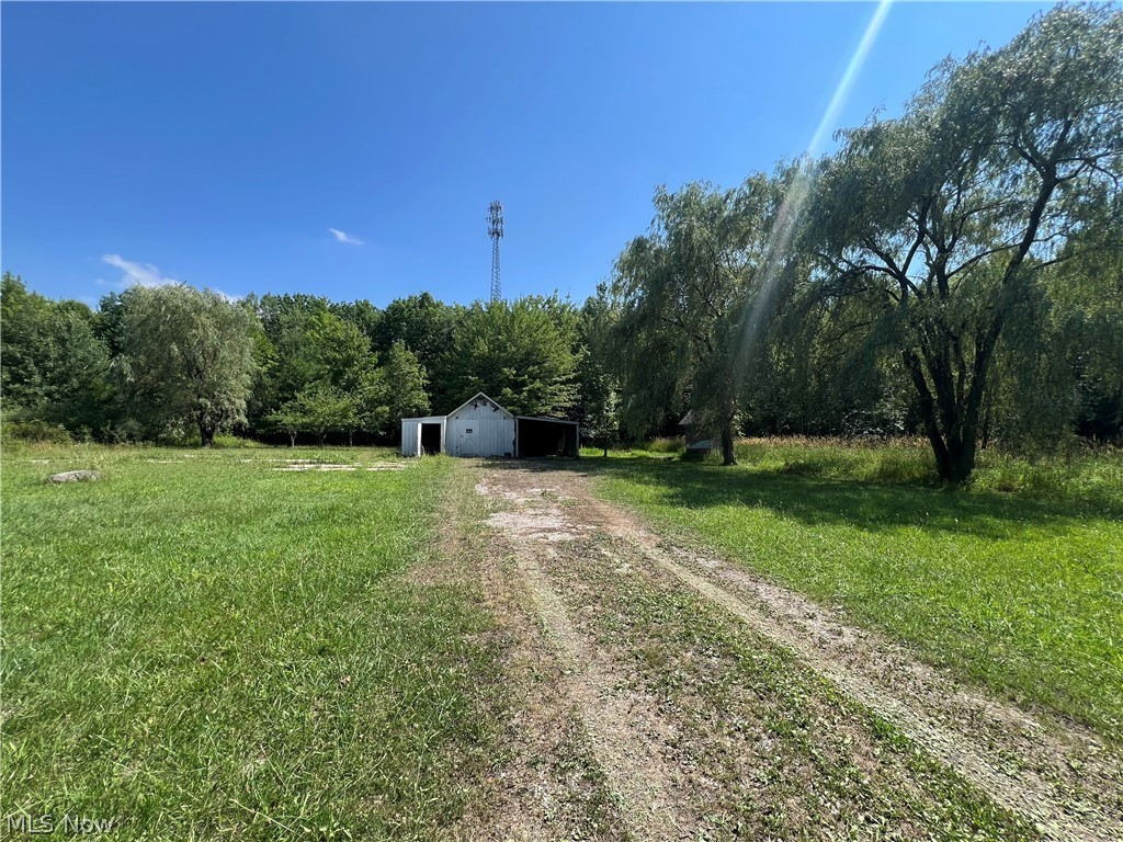 Quiet Country Roadway (Lane) away from the Hustle & Bustle of any noise! 2 Lots being sold together but have 2 separate parcel numbers. The property does have a concrete pad from an old mobile home that had burnt down. electric, old septic and water well is on property (condition not determined) Also, a Shed and a creek running through land on other lot to the west.