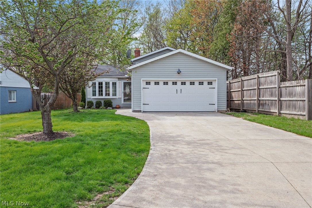 This completely updated home presents a rare opportunity to move right into a beautifully designed, magazine-quality space where every detail has already been considered. Located on a cul-de-sac property in the Riverview Ranches neighborhood in Fairview Park, this 3 bedroom, 2 full bath split-level home blends clean, modern design with warm, inviting finishes, featuring hardwood floors, custom millwork, and distinctive accent walls that create a cohesive, elevated aesthetic in every space. The stunning kitchen is a true centerpiece with a quartz waterfall countertop, all stainless steel appliances, a pot filler, tiled backsplash, and a breakfast bar, all open to the main living area. The living room is filled with natural light from a bay window and is anchored by a statement fireplace with a decorative wood surround. A lower-level family room offers a cozy retreat with built-ins and more custom design details, a spacious laundry room, and a full bath. Bedrooms continue the home’s intentional design with stylish finishes, custom trim work, and a calming, cohesive palette. Both full baths are updated with clean, modern selections. Outdoor living includes a covered patio and partially fenced-in backyard, ideal for everyday enjoyment. An attached 2-car garage adds to the home’s functionality and convenience. RECENT UPDATES: Full roof tear off and replacement (2026), Replaced HVAC (2026), washer/dryer (2025), painted stairway and lower level (2025). INCLUDED are ALL kitchen appliances, washer/dryer, 2 framed TVs, and window treatments. OPTION AVAILABLE TO PURCHASE ALL FURNITURE. Conveniently located near I-480, I-71, Cleveland Hopkins International Airport, Rocky River Reservation, and plenty of shopping, restaurants, and other local attractions. This home is truly a must see!