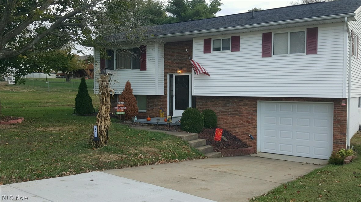 Plenty of natural light.  New carpet & paint in living room.  New six panel doors throughout home.  Hardwood floors in bedrooms.  Modern color scheme!  Updated everything. A home you'd be proud to own.  New heating and AC. Brand new garage door. Call to see this beautiful home!