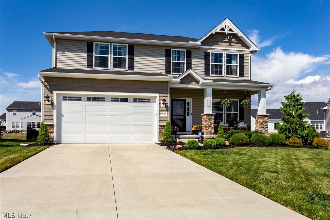 Better than NEW!  This Wellington Model home has a Craftsman style elevation that has great curb appeal and many upgrades inside!  2480 square feet of living space and a partially finished basement with a bathroom.  42" Cabinets with soft-close drawers and doors in the kitchen.  The kitchen also features granite counter-tops, a large island and a custom breakfast bar for extra seating.  Luxury vinyl tile flooring throughout the first floor that was upgraded in 2019, recessed lighting and upgraded lighting on the first floor. The first floor also has a stone, gas log fireplace that has "shiplap" above the fireplace mantel.  The second floor has a loft area, 3 bedrooms and the laundry room.  A large master suite with a modern "board and batten" decorative wall and a huge walk in closet!  The master bath has double sinks and a 5 ft. shower.  Outside the yard was professionally landscaped around the entire house, a 22 x 10 patio and has a 4' aluminum fence around the back yard.  If all the