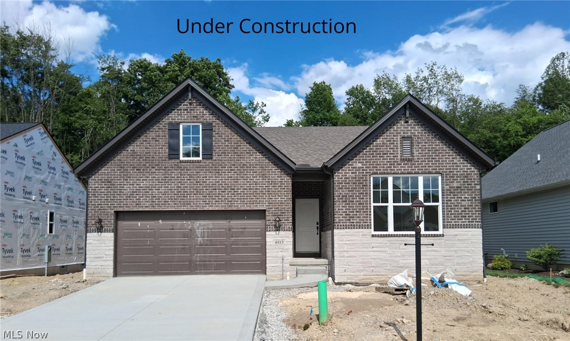 House under construction. Completion in late June/ early July. Discover easy, low-maintenance living in the Sarasota at Villas of Blue Heron. Set in a scenic, park-like community with walking and biking trails, this home includes landscaping and snow removal for a truly carefree lifestyle. Enjoy convenient one-level living with an open family room, kitchen, and dining area. The private primary suite offers a spacious bath retreat and large walk-in closet. A separate wing includes an office and an additional bedroom and a full bath. Community amenities include a pool, walking trails, and tennis and pickleball courts. Pictures are for illustration purposes only.