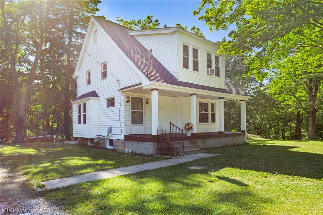 Welcome Home! This cozy craftsman Cape Cod is nestled on an almost full acre lot, with a serene wooded backyard view. Built in the 1930's, this home has been maintained while keeping it's charming characteristics. The first floor of the home features and oversized eat-in kitchen that overlooks the beautiful green backyard and offers plenty of natural lighting. The formal dining room offers space for a larger dining table, and has custom built-in shelves and a storage bench. The living room is cozy with a large picture window, and the first floor also has a bonus room that can serve as an, office, den, or playroom. The first floor also features solid oak flooring. As you venture up the charming staircase to the second floor, you will find three bedrooms with pine wood flooring, and a library or study, with custom book shelving. The second bedroom has knee wall access to attic space, and the third bedroom has a built in nook and dresser drawers to save furniture space. The full bathroom