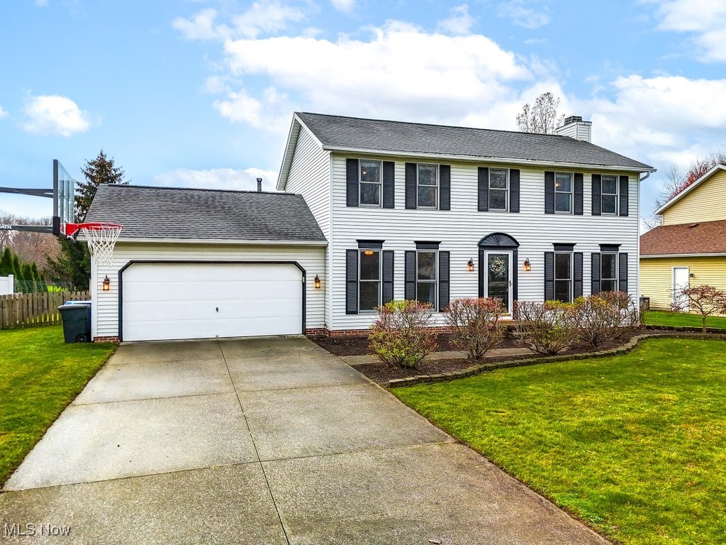 Start 2025 off right in your New home! This attractive and well-maintained center hall colonial in the desirable Fieldstone neighborhood of Kent is ready for its next chapter with the new owner! The main level features a bright and spacious great room with gas fireplace, a formal dining room (currently used as an office). The eat-in kitchen features Stainless steel appliances and a large bay window overlooking the backyard. A convenient half bath and durable laminate flooring (installed in 2022), and neutral paint make this space both stylish and practical. Upstairs, the primary suite provides a relaxing retreat with vaulted ceilings, walk-in closet, and an en suite bath with walk-in shower. Three nicely sized additional bedrooms and a second full bath offer ample space for family or guests.
The full basement provides abundant storage and potential for additional living space as well as a washer and dryer that stay with the house and a radon mitigation system for added peace of mind. Off the kitchen is a slider door that exits to a large deck overlooking a flat, fully fenced yard perfect for your four-legged friends or for entertaining. The home also includes an attached two-car garage and shed for added convenience and storage. Recent updates include a radon system (2019), roof (2012), furnace (2022), water heater (2019), washer/dryer (2021), and dishwasher (2023). The original A/C (1997) is still in great working condition, and the Sellers are offering a one-year Home Warranty to the new owner. With its conveniently location near downtown Kent, Kent State University, Stow shopping, and Route 8, this move-in ready home offers a great value with comfort, style, and convenience. Start the New Year in your new home! Come see today!