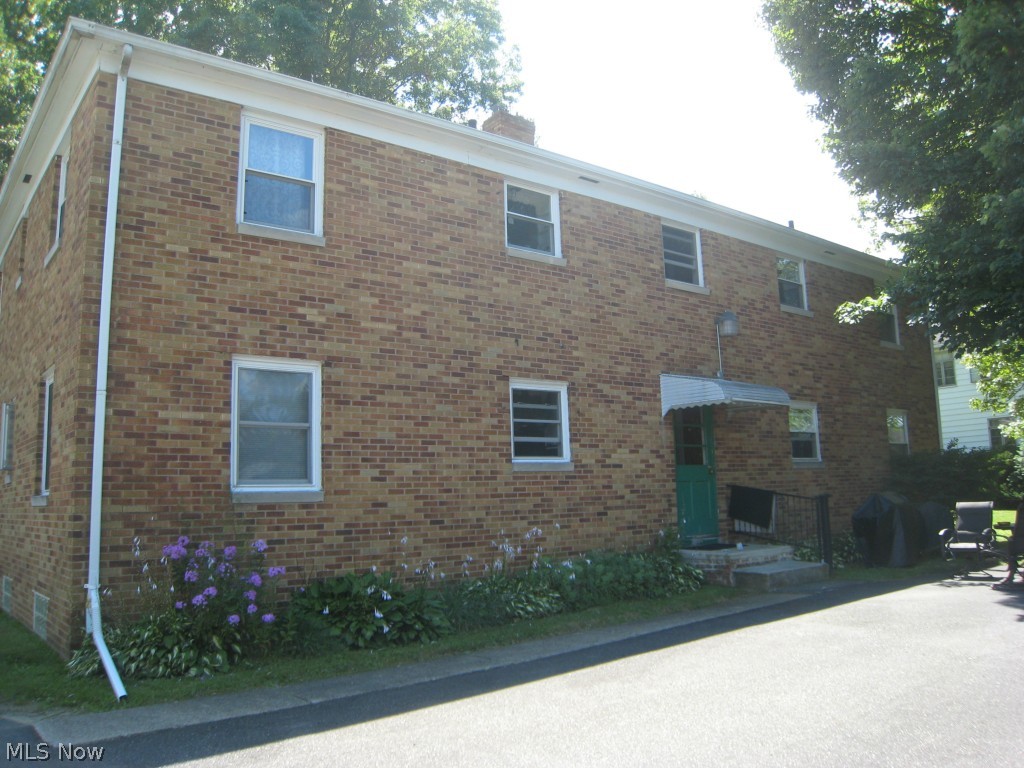 Invitingly priced! Brick 4 unit! Close to everything!  Shopping, schools, park, medical and public transportation.  Minutes to I-77.  Nicely updated and maintained with each unit having Living room/dining room combo, 2 bedrooms and 1 bath.  Newer vinyl replacement windows and furnaces.  There is a front and rear entry and parking in the rear.  Full basement with separate laundry hook ups for each unit, Separate utilities and plenty of storage. 2 long term tenants.