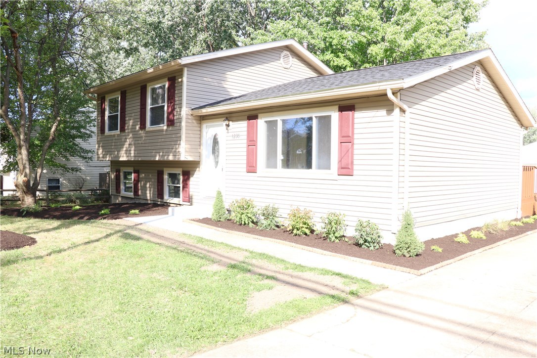 Great home in the Copley school district!  This 3 bedroom split level has eye catching curb appeal and a wonderful back yard and deck.  The living room has a tiled entry area with a coat closet.  It opens up into the dining area where there is access to the deck.  The kitchen and dining area are nice and open for entertaining.  New stainless range and dishwasher, newer laminate floors and oak cabinetry.  On the second level you will find all three bedrooms and full bath.  The renovated bathroom has tile floors, tile tub surround and a jacuzzi tub.  On the lower level is the bonus room.  Perfect as a family room, office or man cave.  This level also has a walk-out to the back yard.  Brand new carpet in the living room, family room, hall and bedrooms. Newer windows, roof and furnace.  Deck was just stained.  Large 2.5 car garage is brightly lit with shop lights and all the storage you need.  Schedule your showing now!!