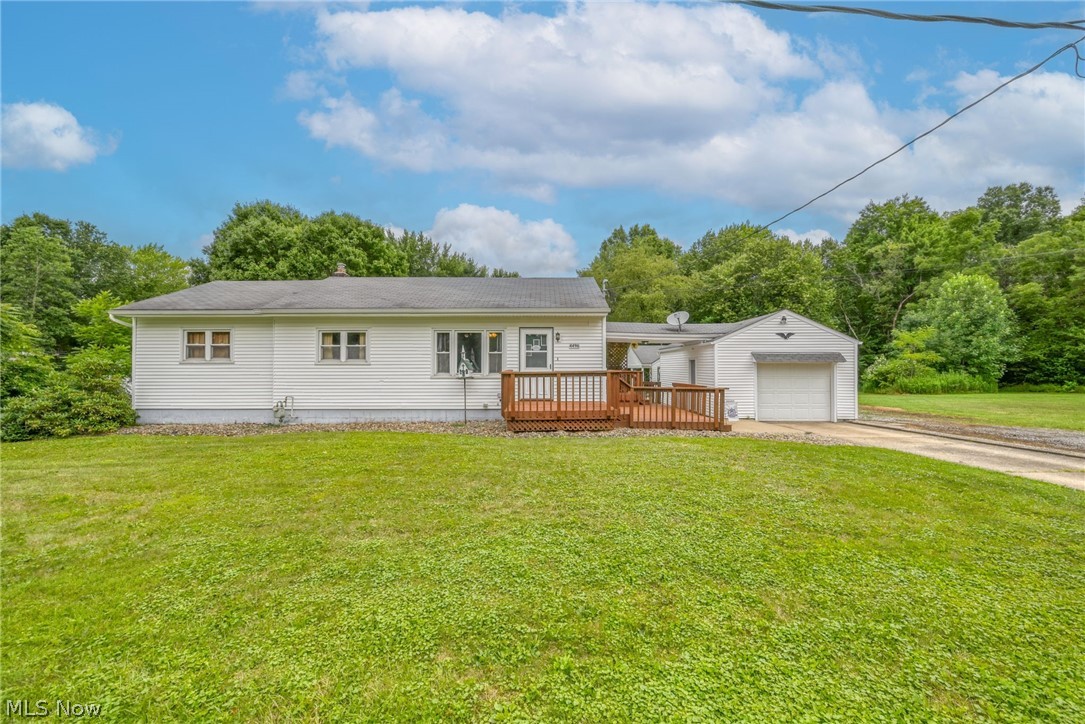 Welcome to 4496 Ticknor Avenue, you will not be disappointed with this well updated and well maintained 3 Bedroom 2 Bath ranch home situated in beautiful Newton Falls.  This home features a well appointed eat in kitchen with loads of storage and under counter lighting.  The layout of this home is quite unique, featuring three large bedrooms including the Master Bedroom with Master Bath as well as the living room with a large Bay window and flexible space currently used as an office. The basement is partially finished with many options for the use of the space.  The covered deck leads to a one car garage with ample storage.  The outdoors of this property are very unique featuring an above ground pool with a gated deck and solar heater, a playground area all in a park like setting with mature trees and well landscaped.  The outbuildings on this property bring a sense of opportunity and much flexibility with a two car garage with a workshop attached including electricity, heat, water and air lines already ran.  A large 43x33 Workshop/storage building with electric and a large loft that could have many uses sit near the property's edge with an entrance from nearby Russel Street to its garage door.  There are also 3 smaller storage sheds balancing both property aesthetics and functionality.  This property must be viewed in person in order to fully comprehend the endless possibilities, schedule your private showing today!