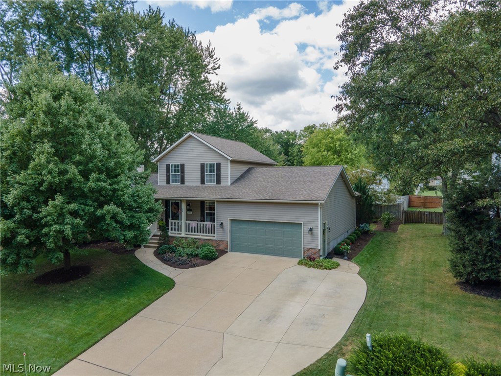 The "WOW FACTOR" - Beautiful Home with first floor Master Suite!  Must see!  
Recent improvements include:
Interior and exterior lighting, kitchen updates (quartz countertops, sink, faucet, appliances), sun shader awning over back patio, bathroom updates (faucets, toilets, sinks, cabinets), imported porcelain flooring (kitchen, powder room, hall entry, laundry), basement professionally finished with family room, office and full bath in 2004, interior recently freshly painted.