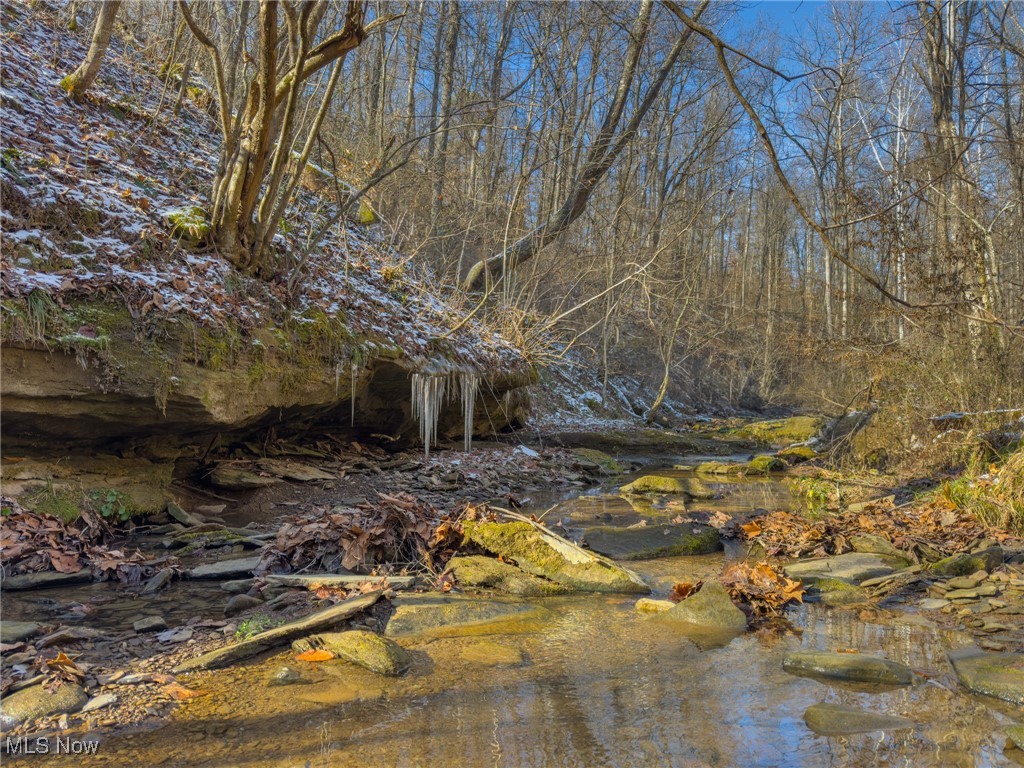 Secluded 78 Acre Prime Hunting & Build-Ready Property
Escape to the Ohio countryside on this exceptional 78-acre tract located on Null Rd. in Coolville, Ohio. Whether you’re searching for a prime hunting property, recreational retreat, or the perfect location to build your dream home, this land offers privacy, infrastructure, and natural beauty in one turnkey package. Designed for serious hunters and outdoor enthusiasts, this property is already set up for success with established food plots and an extensive trail system. A year-round creek winds through the property, and a unique rock outcropping adds scenic character, making this not only a highly productive hunting tract but also a stunning setting for a future home or cabin.
Land & Location:
• 77.86 acres
• Wooded lot
• 3 large, established food plots
• Excellent deer habitat
• Rolling terrain with well-maintained trails
• Gated access
• Gravel driveway & parking pad
• Year-round creek & rock outcropping
• Power and public water in place
• Mix of young and large mature oaks
Additional Highlights:
• Turnkey prime hunting tract ready for the upcoming season
• Ideal homesite potential with utilities already in place
• Excellent blend of recreation, investment, and residential opportunity
• Soil improvement by Whitetail Hill
• Food plots planted with Green Cover, corn, and radish
• Includes camper and one blind, all other hunting equipment to be determined
Mineral rights owned by the seller will convey. Annual taxes $3,181.58