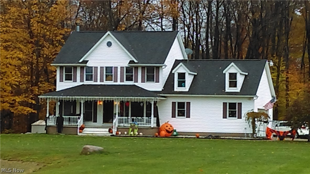Nice find on this 4 bedroom Colonial on almost 7 wooded acres - Cherry trim and tastefully done - Corian counter tops, first floor laundry and large pond - Rec room in basement area - whole house wood burner outside.