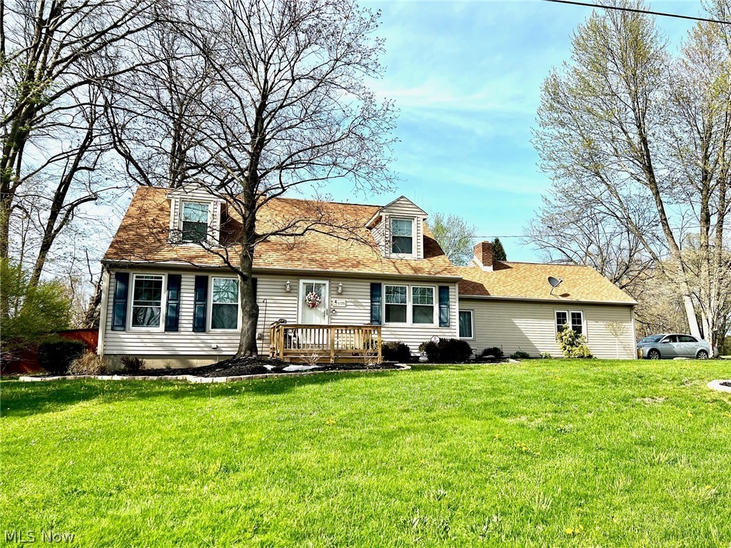 This charming 4 bedroom, 3.5 bathroom cape cod is located in a desirable Howland neighborhood.  Numerous features include a  brightly-lit living room and formal dining room with beautiful hardwood flooring. A gorgeous, updated(2015) eat-in kitchen with a large island/breakfast bar, recessed lighting, beautiful cherry cabinets, newer stainless steel appliances, and bar style seating. The family room has laminate flooring and a wood burning fireplace, with access to the large sunroom at the rear of the house. The first floor master bedroom has ample closet space along with a full bath with a walk-in shower. An additional half bath is located on the first floor as well. Upstairs you’ll find two generous bedrooms with beautiful hardwood flooring , great closet space, charming dormer area, and another full bath.  The full, finished basement boasts a fabulous, spacious bedroom, with walk-in closet, and full bath with double vanities, and a rec room, both with laminate flooring.   Outside off